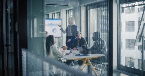 Meeting in a glass office